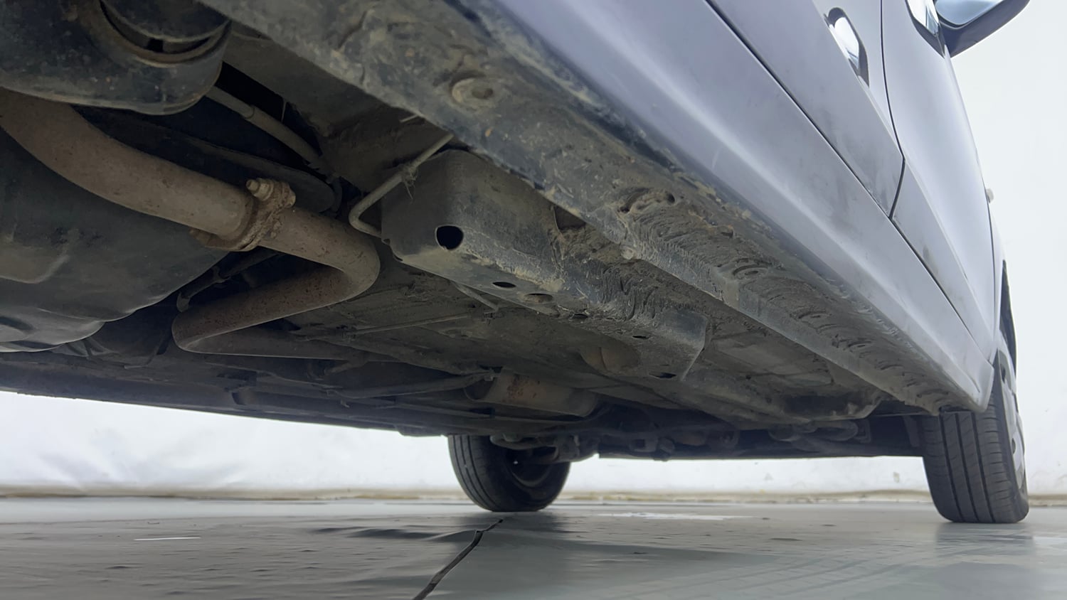 Used 2021 Tata Tigor XM Petrol Manual extra REAR RIGHT UNDERBODY VIEW