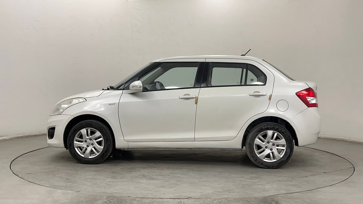 Used 2012 Maruti Suzuki Swift Dzire ZXI Petrol Manual exterior LEFT SIDE VIEW