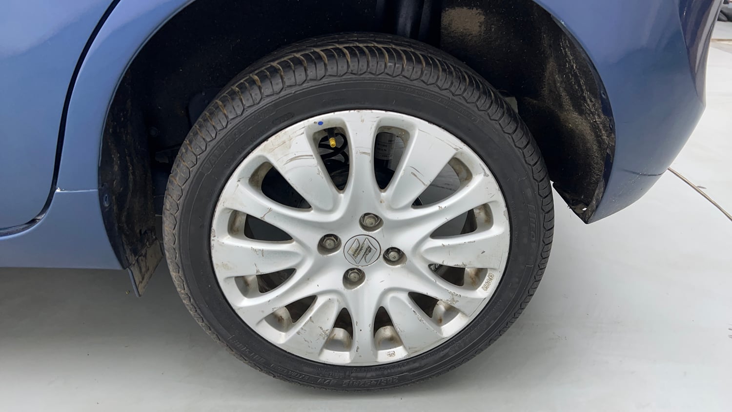 Used 2015 Maruti Suzuki Baleno Zeta 1.2 Petrol Manual tyres LEFT REAR TYRE RIM VIEW