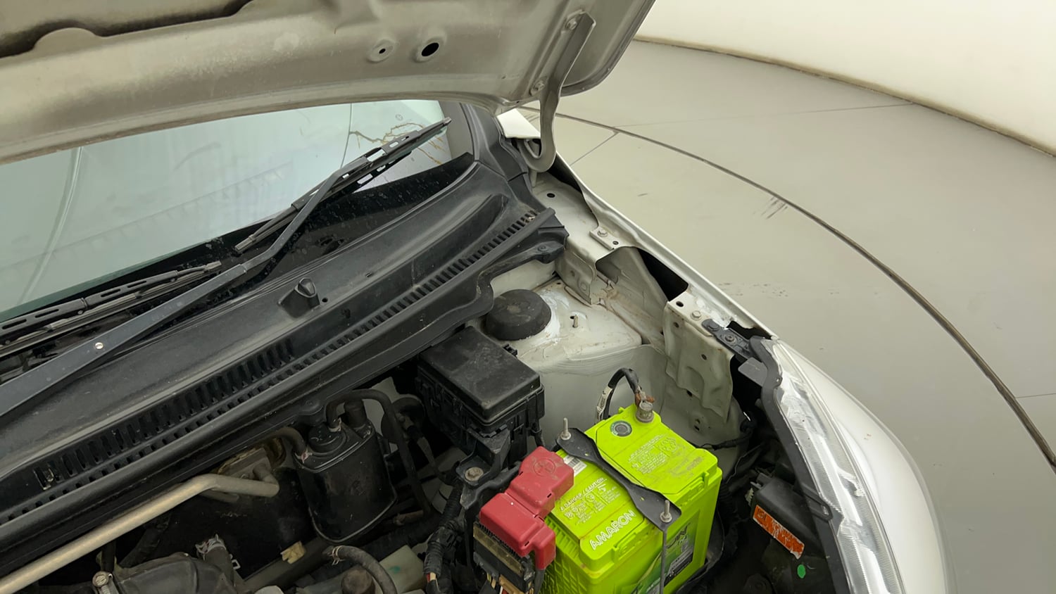 Used 2017 Maruti Suzuki Celerio VXi AMT Petrol Automatic engine ENGINE LEFT SIDE HINGE & APRON VIEW