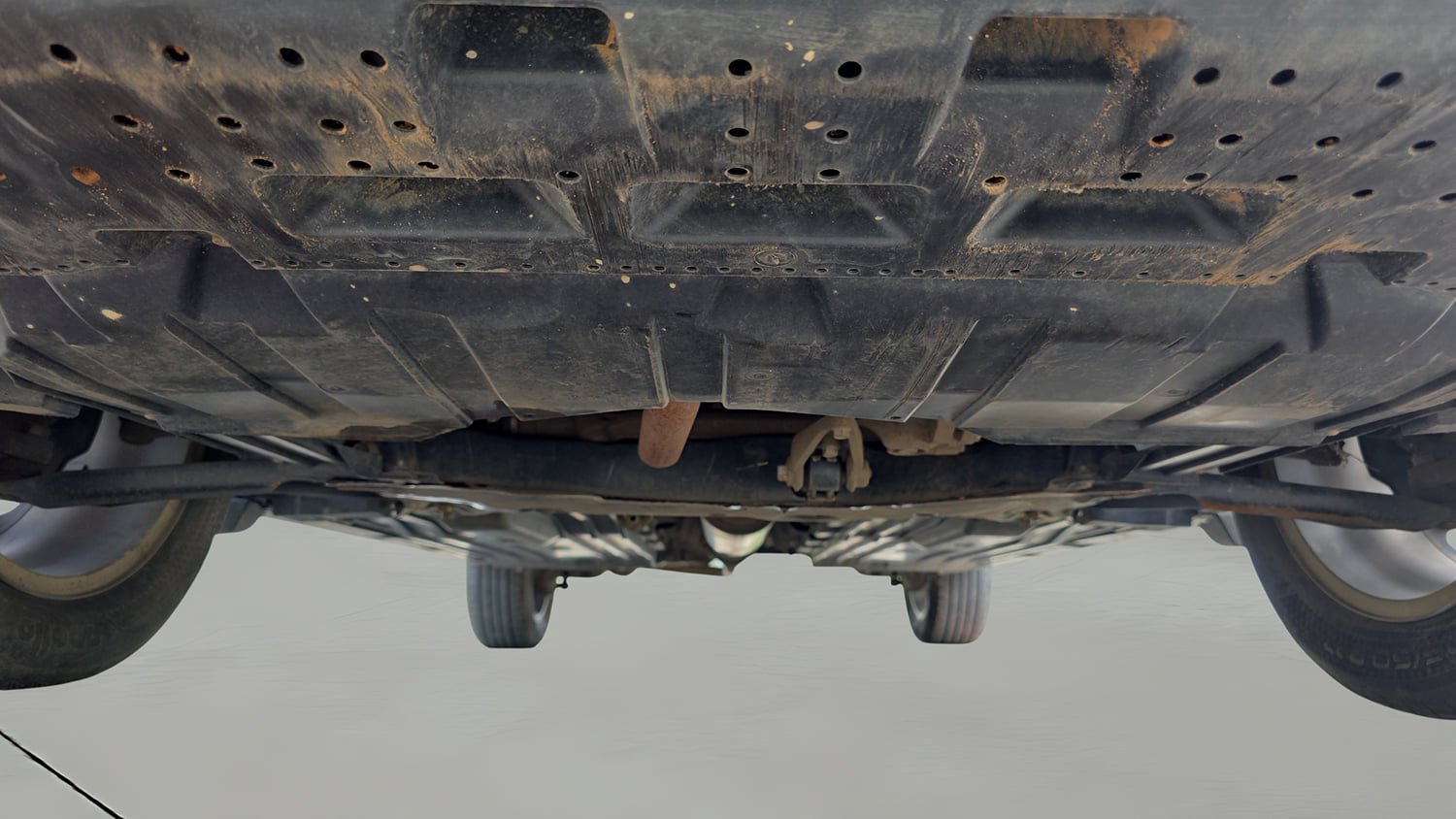 Used 2023 Maruti Suzuki Grand Vitara Zeta Smart Hybrid Petrol Manual extra FRONT LEFT UNDERBODY VIEW