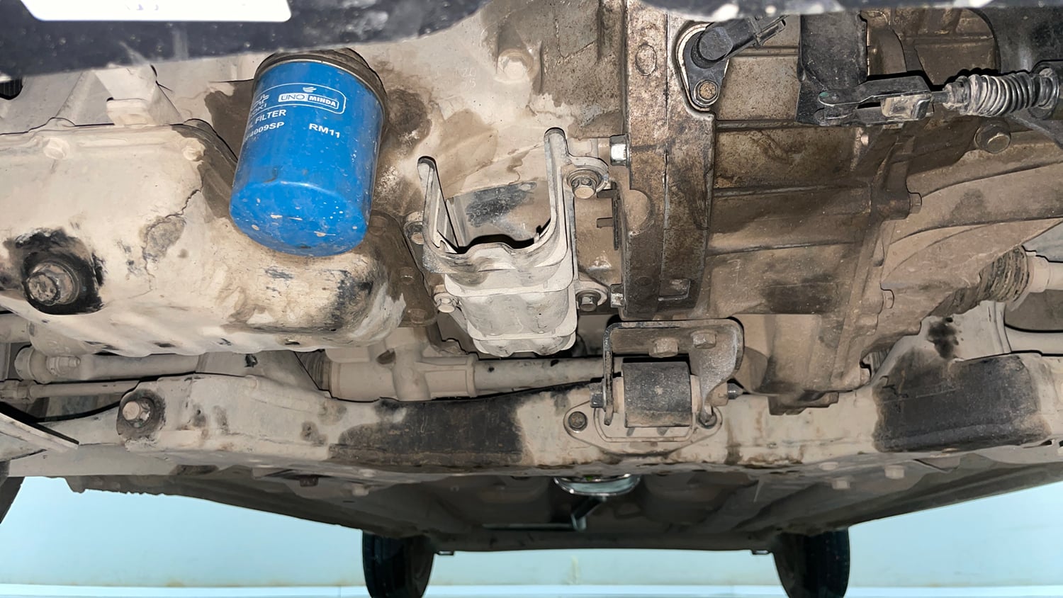 Used 2014 Hyundai Grand i10 Magna 1.2 Kappa VTVT Petrol Manual extra FRONT LEFT UNDERBODY VIEW