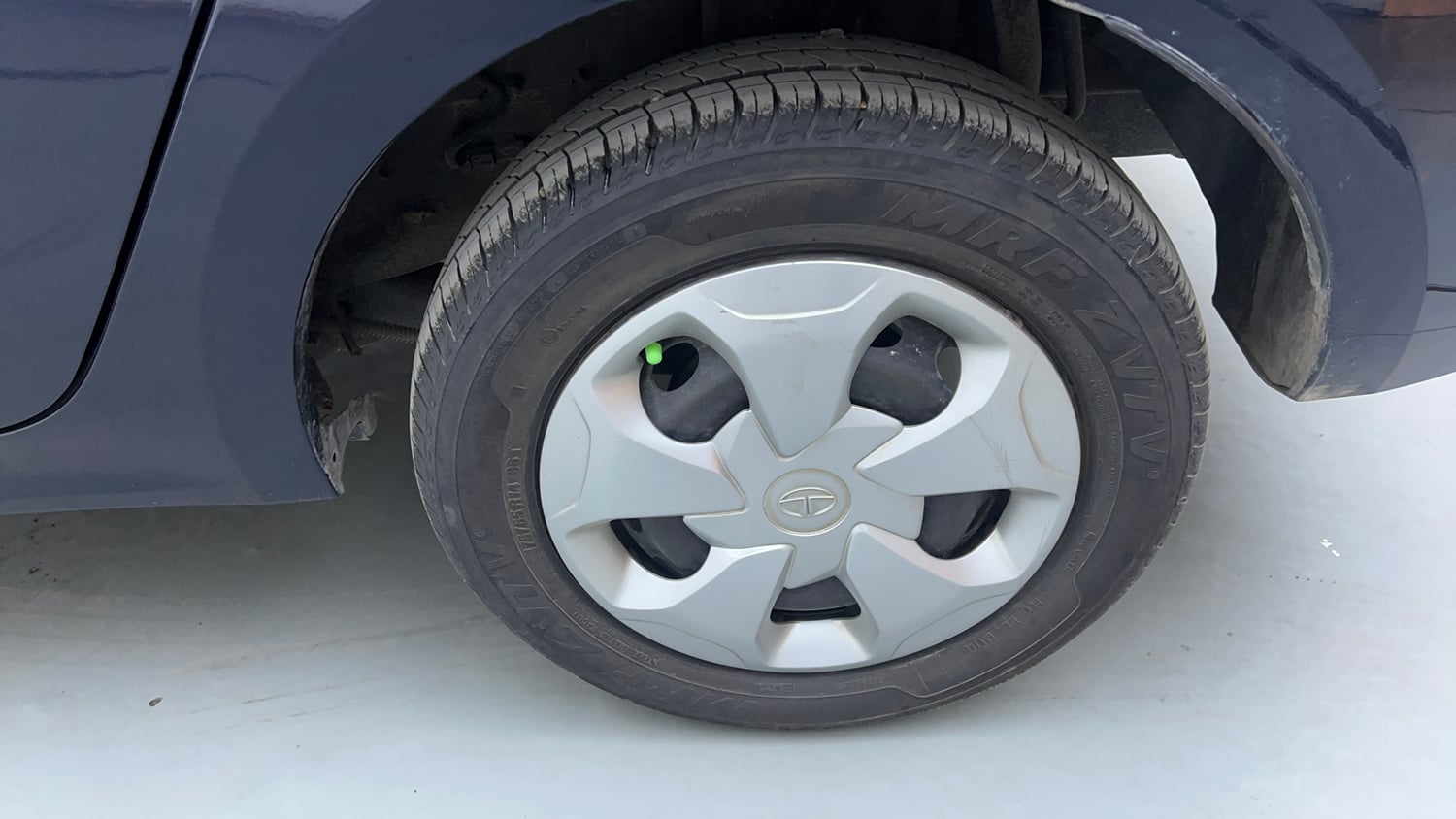 Used 2021 Tata Tigor XM Petrol Manual tyres LEFT REAR TYRE RIM VIEW
