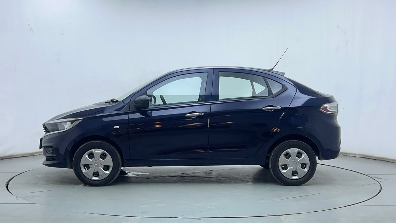 Used 2021 Tata Tigor XM Petrol Manual exterior LEFT SIDE VIEW