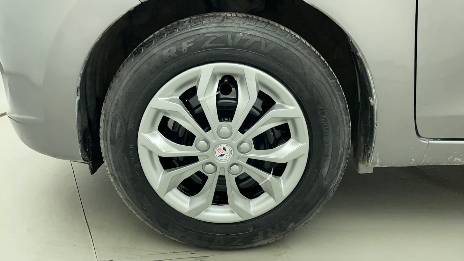 Used 2014 Maruti Suzuki Celerio VXi AMT Petrol Automatic tyres LEFT FRONT TYRE RIM VIEW