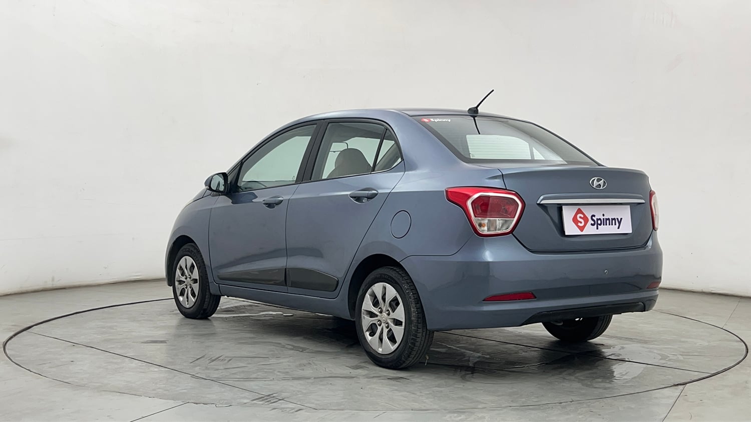 Used 2015 Hyundai Xcent S 1.2 Petrol Manual exterior LEFT REAR CORNER VIEW