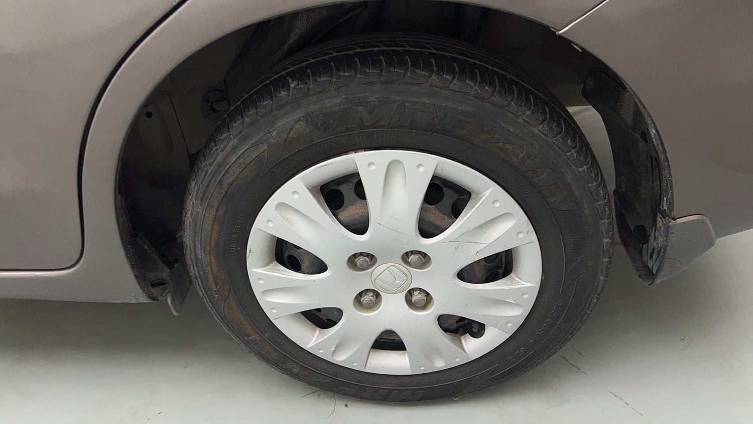 Used 2014 Honda Amaze 1.2 S i-VTEC Petrol Manual tyres LEFT REAR TYRE RIM VIEW