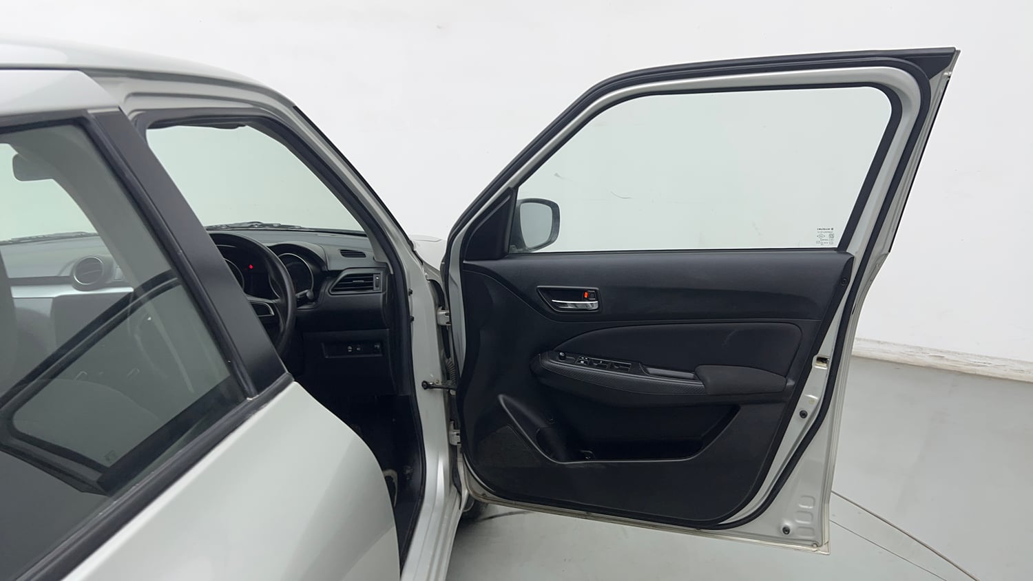 Used 2021 Maruti Suzuki Swift VXi Petrol Manual interior RIGHT FRONT DOOR OPEN VIEW