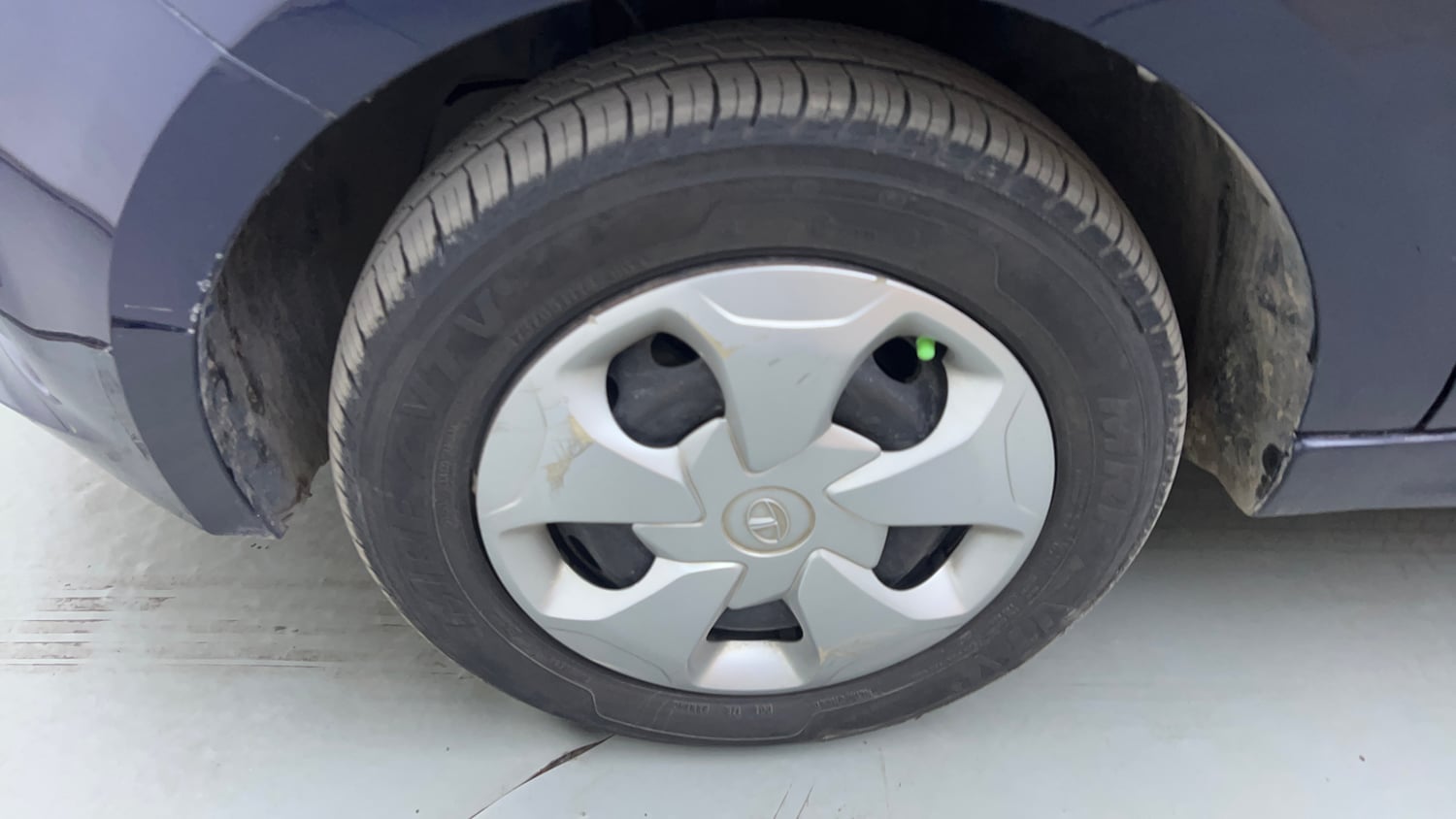 Used 2021 Tata Tigor XM Petrol Manual tyres LEFT FRONT TYRE RIM VIEW