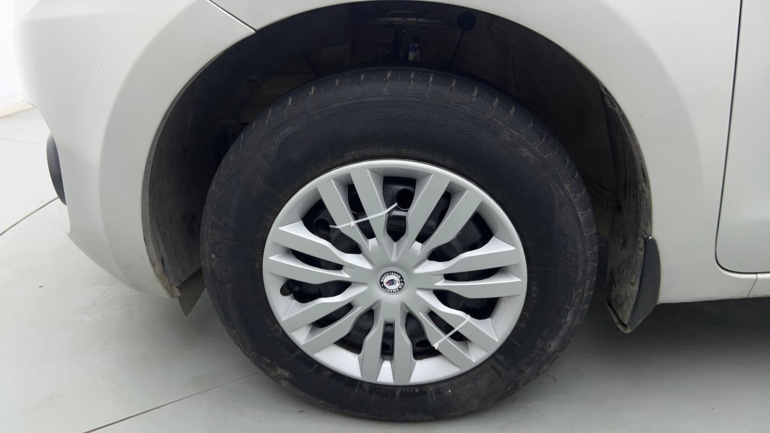 Used 2021 Maruti Suzuki Swift VXi Petrol Manual tyres LEFT FRONT TYRE RIM VIEW
