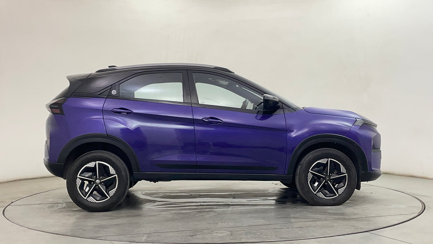 Used 2024 Tata Nexon Fearless Plus S Purple 1.2 Revotron Petrol 7DCA Dual Tone Petrol Automatic exterior RIGHT SIDE VIEW