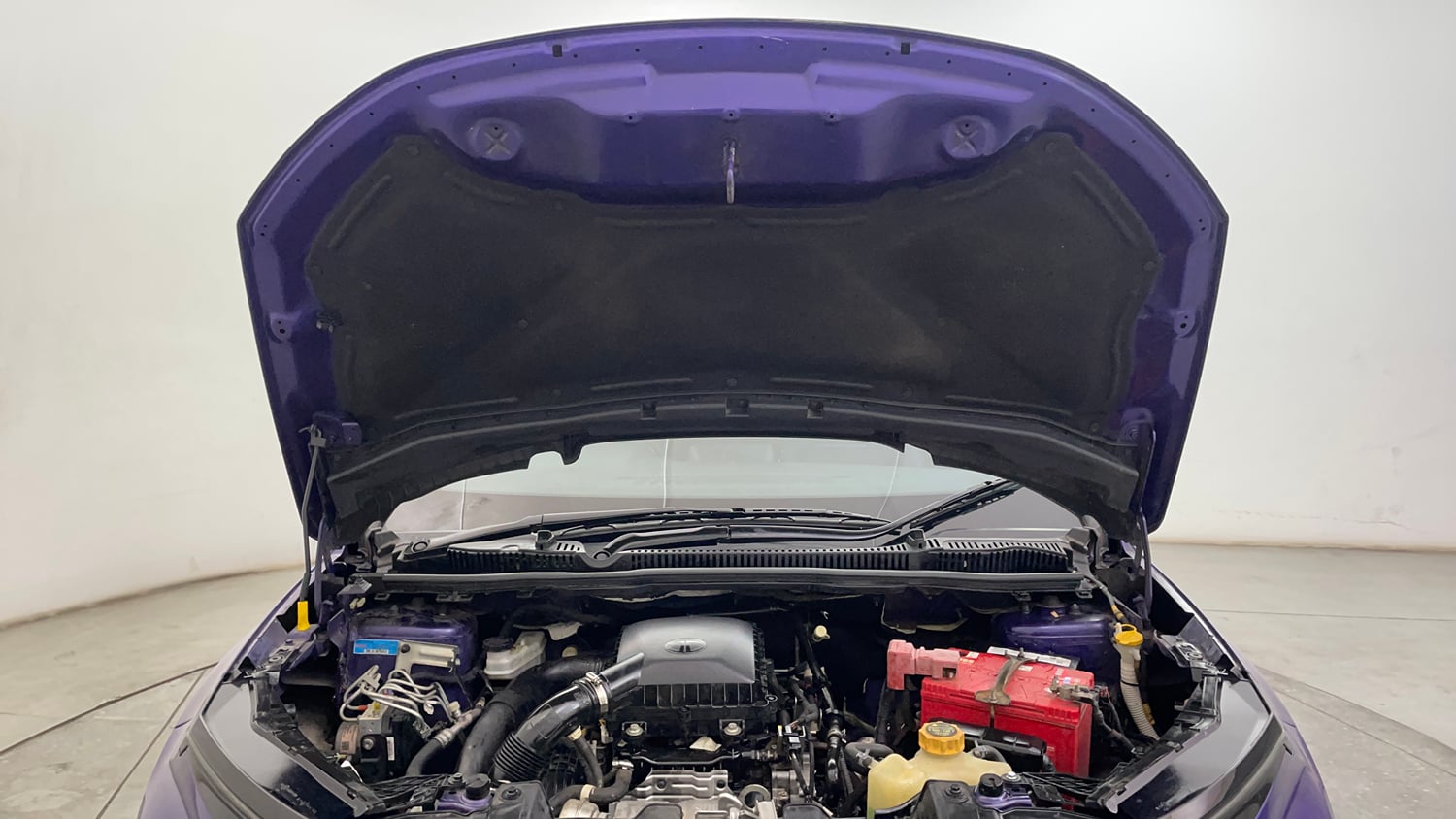 Used 2024 Tata Nexon Fearless Plus S Purple 1.2 Revotron Petrol 7DCA Dual Tone Petrol Automatic engine ENGINE & BONNET OPEN FRONT VIEW