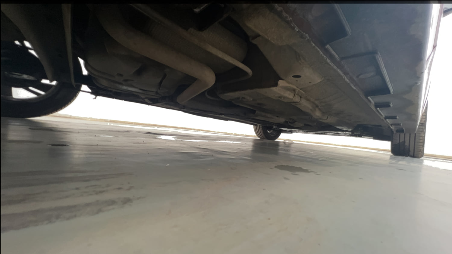 Used 2020 Hyundai New i20 Asta (O) 1.0 Turbo DCT Petrol Automatic extra REAR RIGHT UNDERBODY VIEW