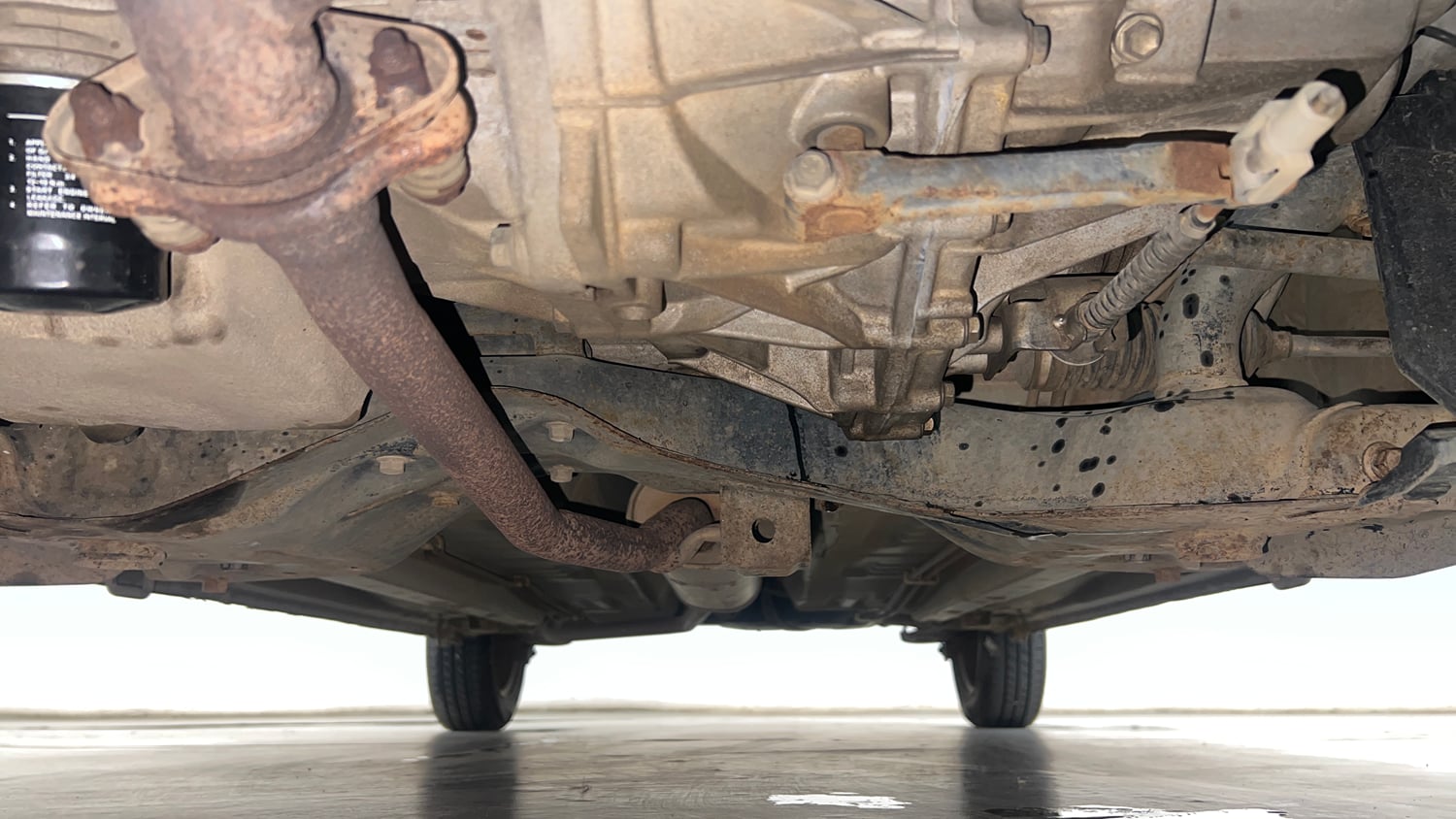 Used 2014 Maruti Suzuki Celerio VXi Petrol Manual extra FRONT LEFT UNDERBODY VIEW