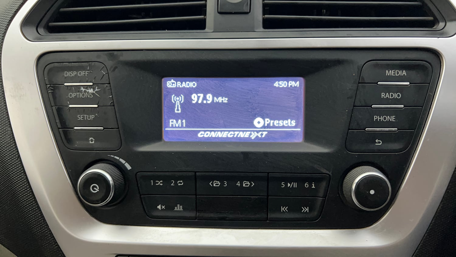 Used 2017 Tata Tiago Revotron XT Petrol Manual top_features Integrated (in-dash) music system