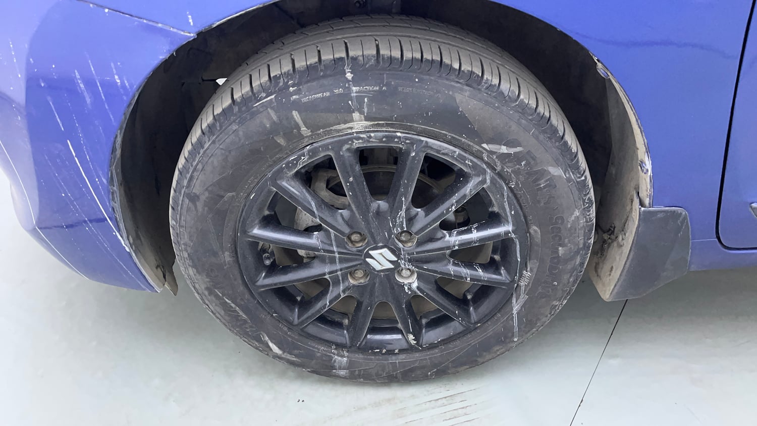 Used 2017 Maruti Suzuki Baleno Delta 1.2 Petrol Manual tyres LEFT FRONT TYRE RIM VIEW