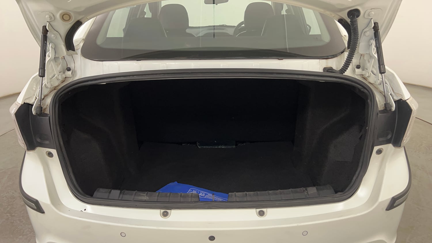 Used 2024 Tata Tigor XZ Petrol Manual interior DICKY INSIDE VIEW