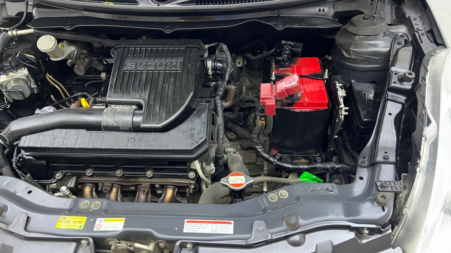 Used 2016 Maruti Suzuki Swift VXI (O) Petrol Manual engine ENGINE LEFT SIDE VIEW