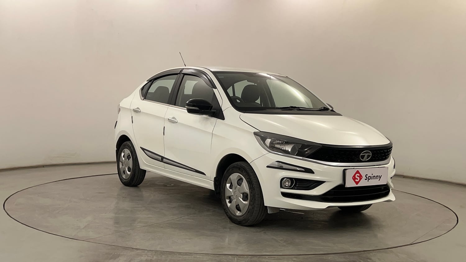 Used 2024 Tata Tigor XZ Petrol Manual exterior RIGHT FRONT CORNER VIEW