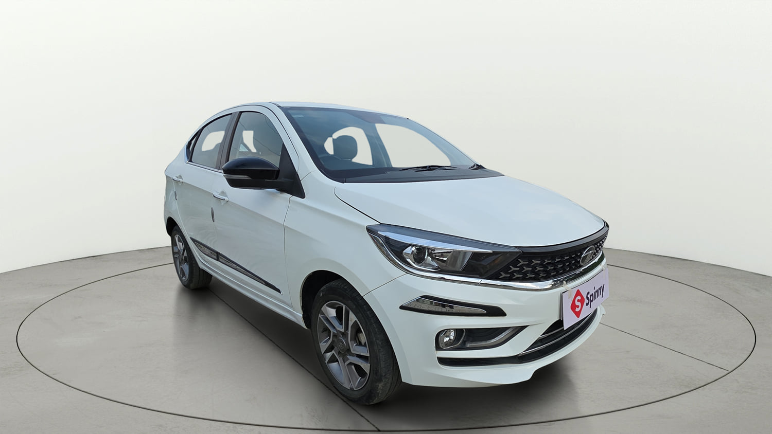 Used 2023 Tata Tigor XZ Plus Leatherette Pack Petrol Manual exterior RIGHT FRONT CORNER VIEW