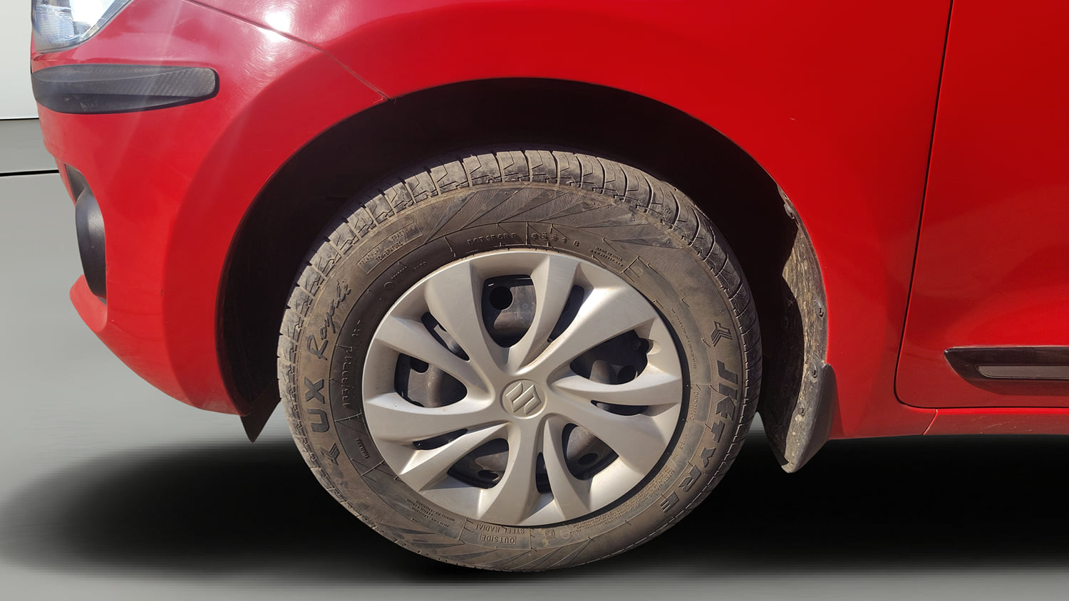 Used 2022 Maruti Suzuki Swift VXi Petrol Manual tyres LEFT FRONT TYRE RIM VIEW