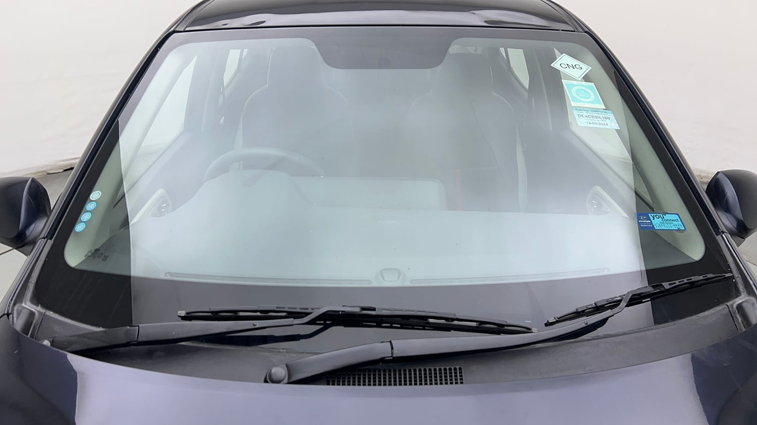 Used 2024 Hyundai Aura SX 1.2 CNG Cng Manual exterior FRONT WINDSHIELD VIEW
