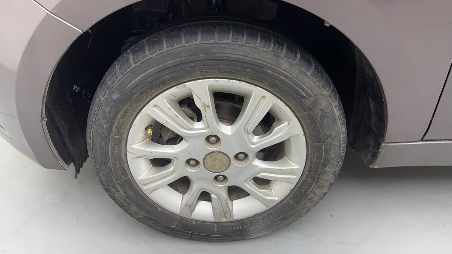Used 2017 Tata Tiago Revotron XZ Petrol Manual tyres LEFT FRONT TYRE RIM VIEW