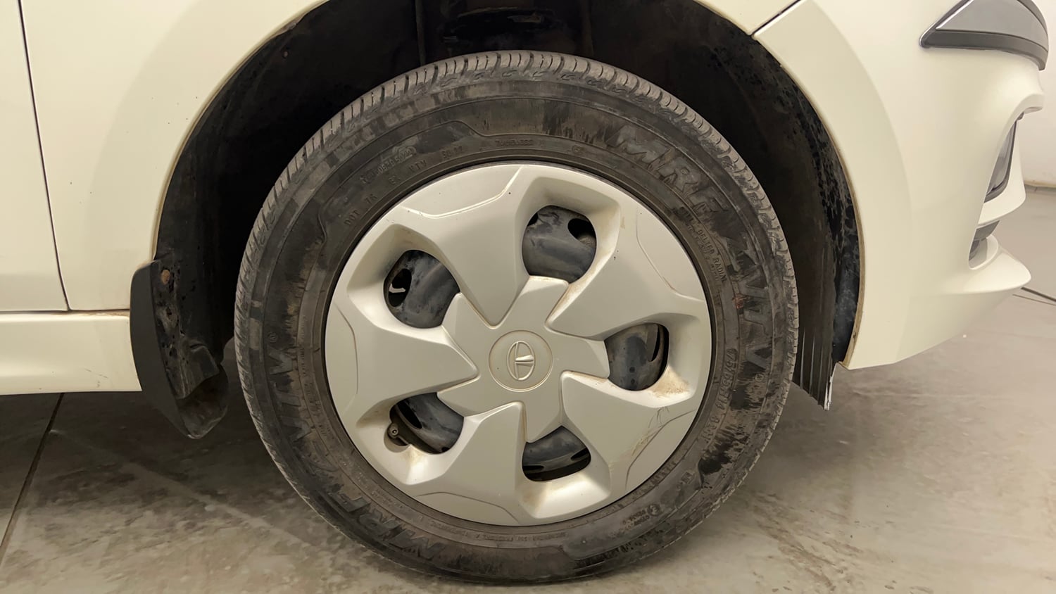 Used 2024 Tata Tigor XZ Petrol Manual tyres RIGHT FRONT TYRE RIM VIEW