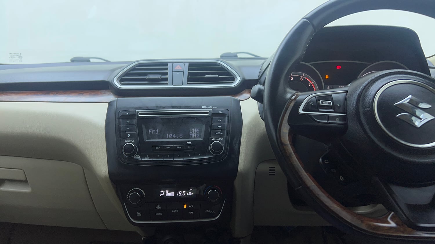 Used 2018 Maruti Suzuki Dzire ZXi Petrol Manual top_features Integrated (in-dash) music system
