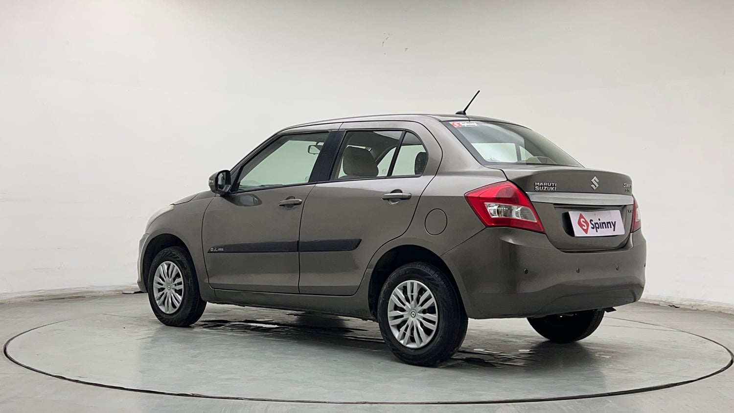 Used 2015 Maruti Suzuki Swift Dzire VXI Petrol Manual exterior LEFT REAR CORNER VIEW