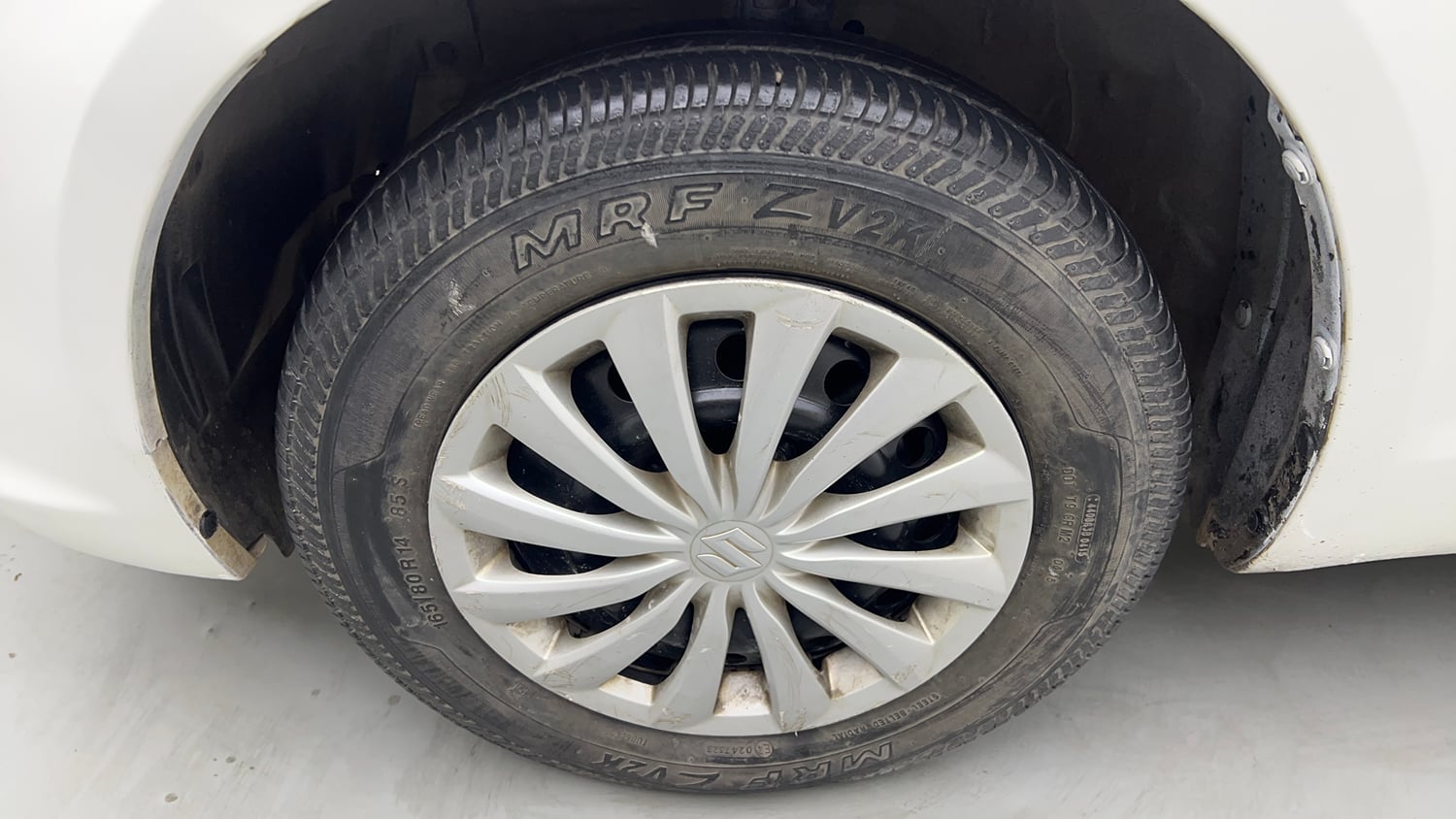 Used 2015 Maruti Suzuki Swift Dzire VXI Petrol Manual tyres LEFT FRONT TYRE RIM VIEW
