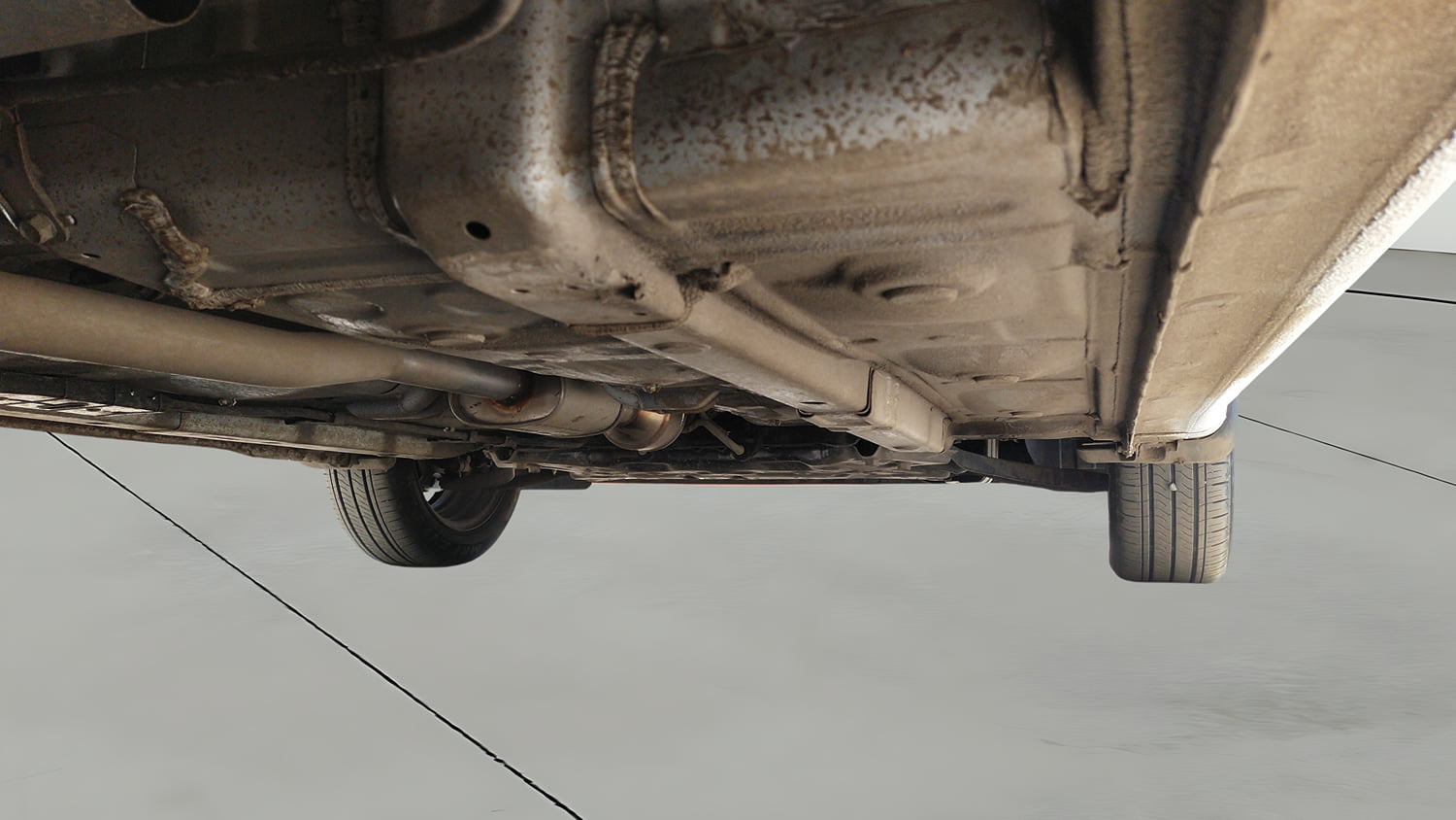 Used 2026 Hyundai Grand i10 Nios Sportz 1.2 Kappa AMT Petrol Automatic extra REAR RIGHT UNDERBODY VIEW