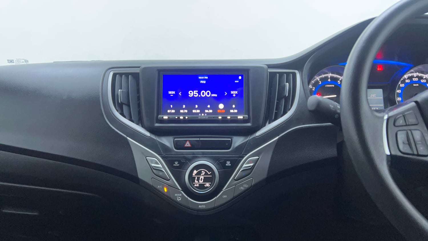 Used 2021 Maruti Suzuki Baleno Delta Petrol Manual interior MUSIC SYSTEM & AC CONTROL VIEW