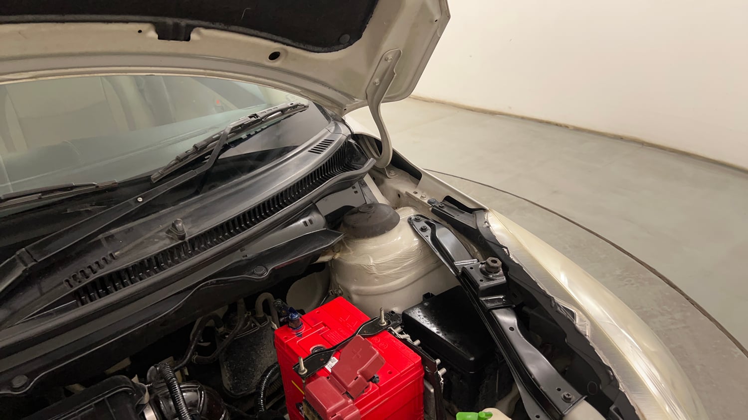 Used 2012 Maruti Suzuki Swift Dzire VXI Petrol Manual engine ENGINE LEFT SIDE HINGE & APRON VIEW