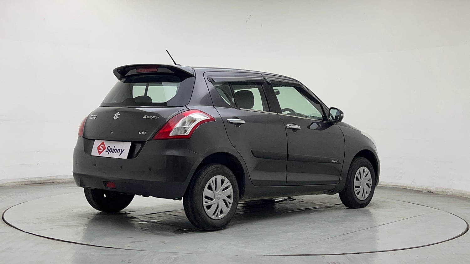 Used 2016 Maruti Suzuki Swift VXI (O) Petrol Manual exterior RIGHT REAR CORNER VIEW