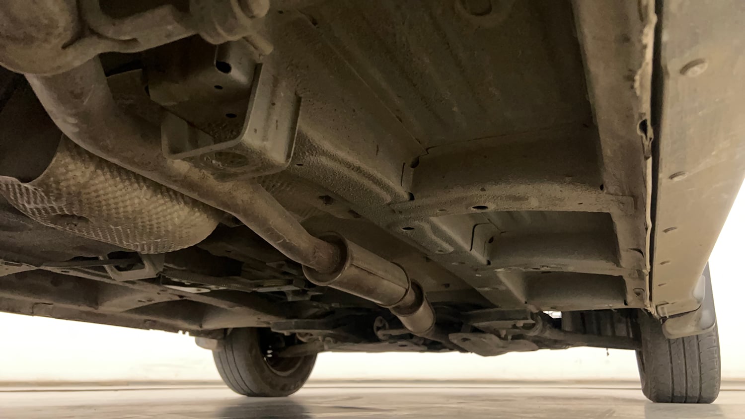 Used 2019 Mahindra KUV100 NXT K6 Plus 6 STR Petrol Manual extra REAR RIGHT UNDERBODY VIEW