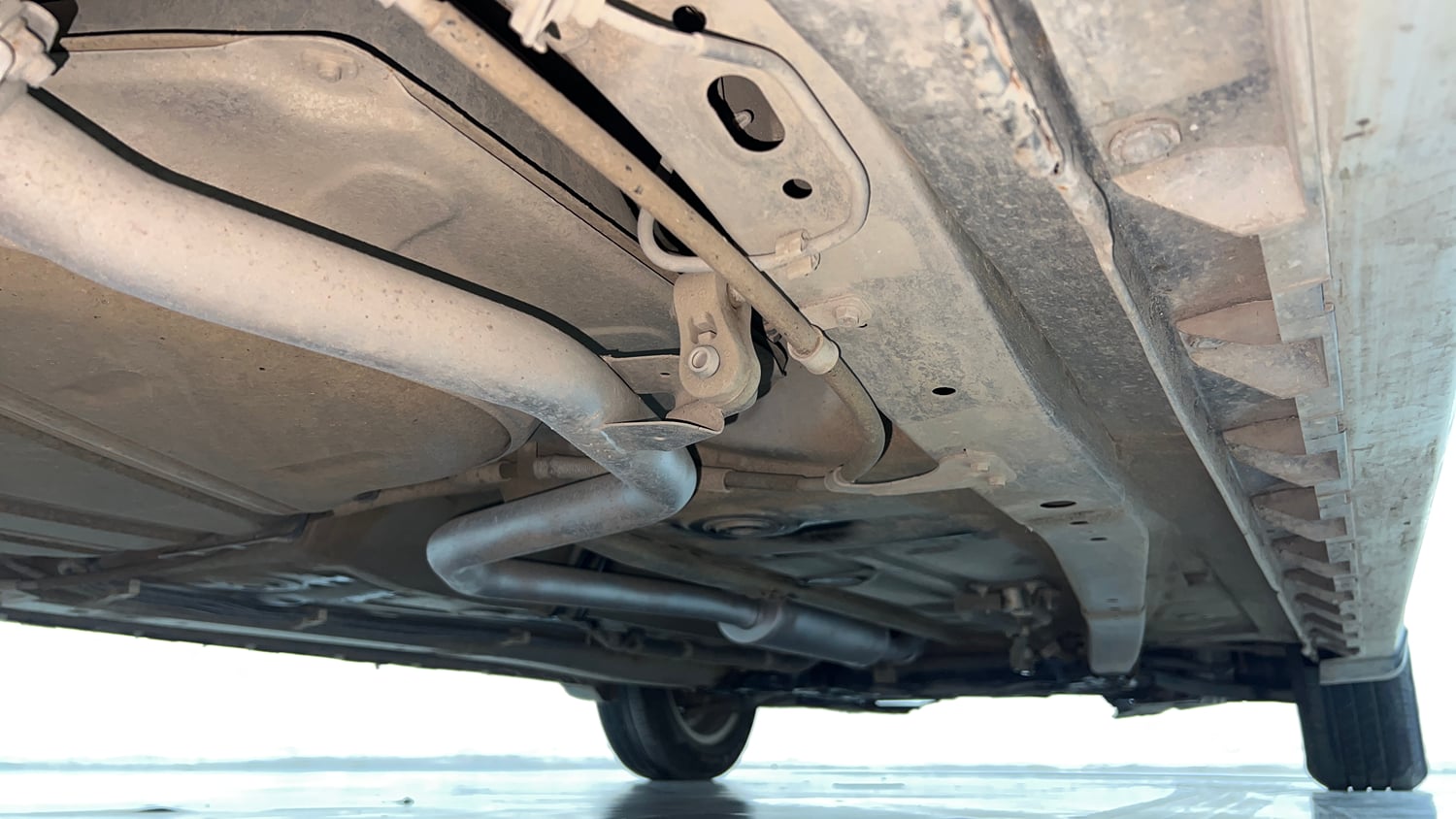 Used 2021 Maruti Suzuki XL6 Zeta MT Petrol Petrol Manual extra REAR RIGHT UNDERBODY VIEW