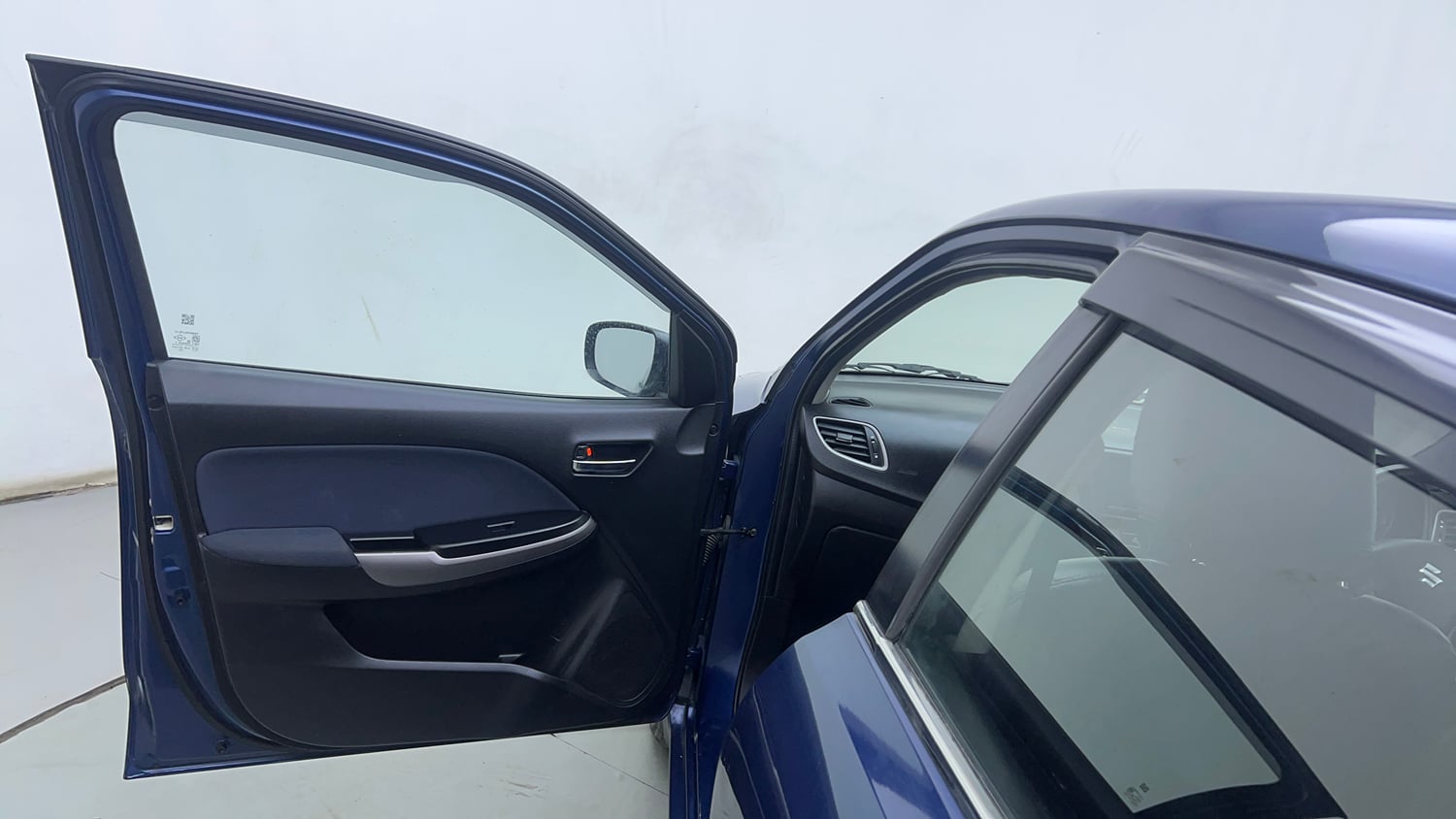 Used 2021 Maruti Suzuki Baleno Delta Petrol Manual interior LEFT FRONT DOOR OPEN VIEW
