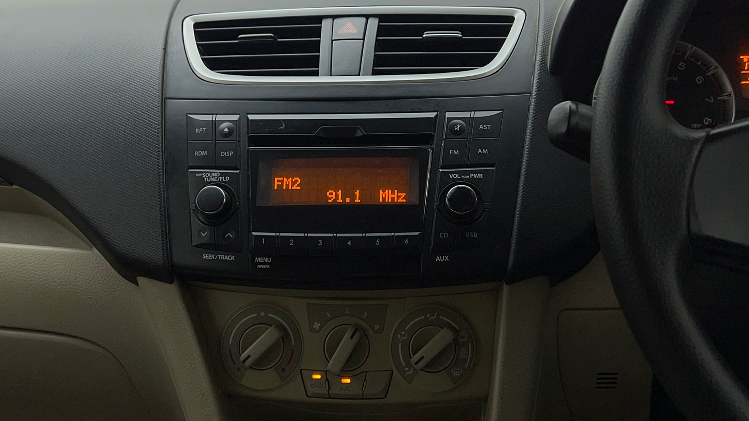 Used 2015 Maruti Suzuki Swift Dzire VXI Petrol Manual top_features Integrated (in-dash) music system