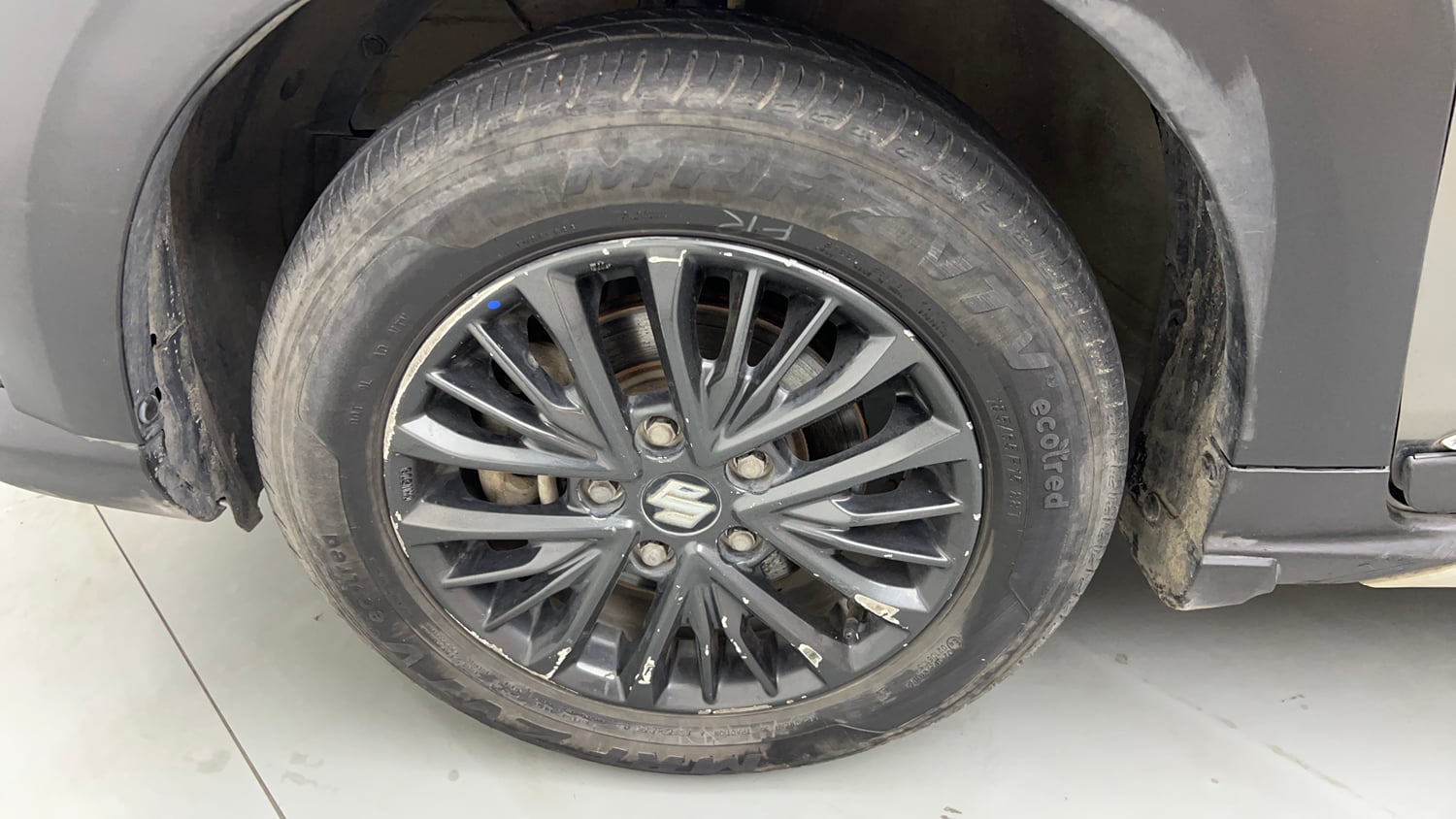 Used 2021 Maruti Suzuki XL6 Zeta MT Petrol Petrol Manual tyres LEFT FRONT TYRE RIM VIEW