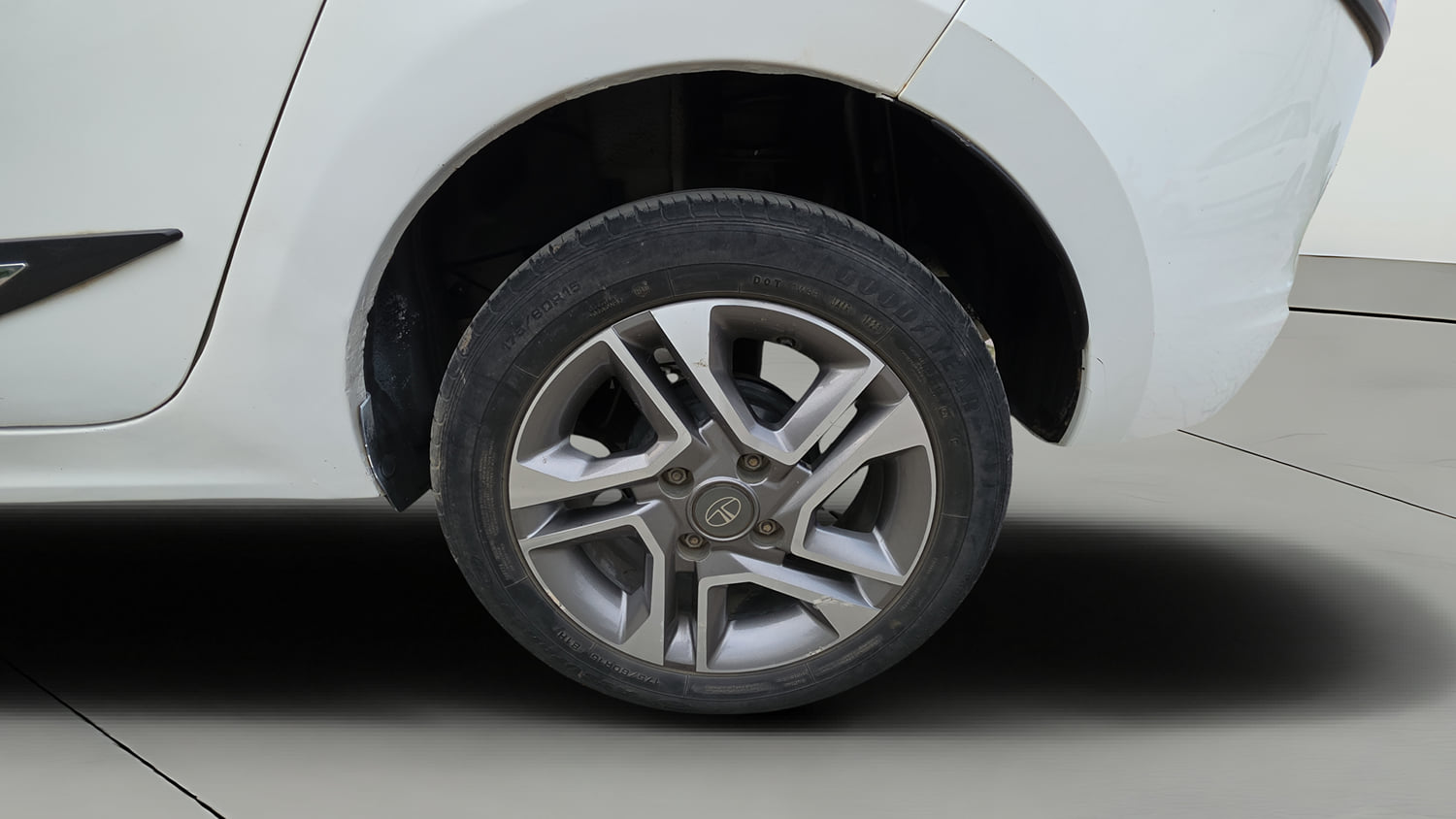 Used 2023 Tata Tigor XZ Plus Leatherette Pack Petrol Manual tyres LEFT REAR TYRE RIM VIEW