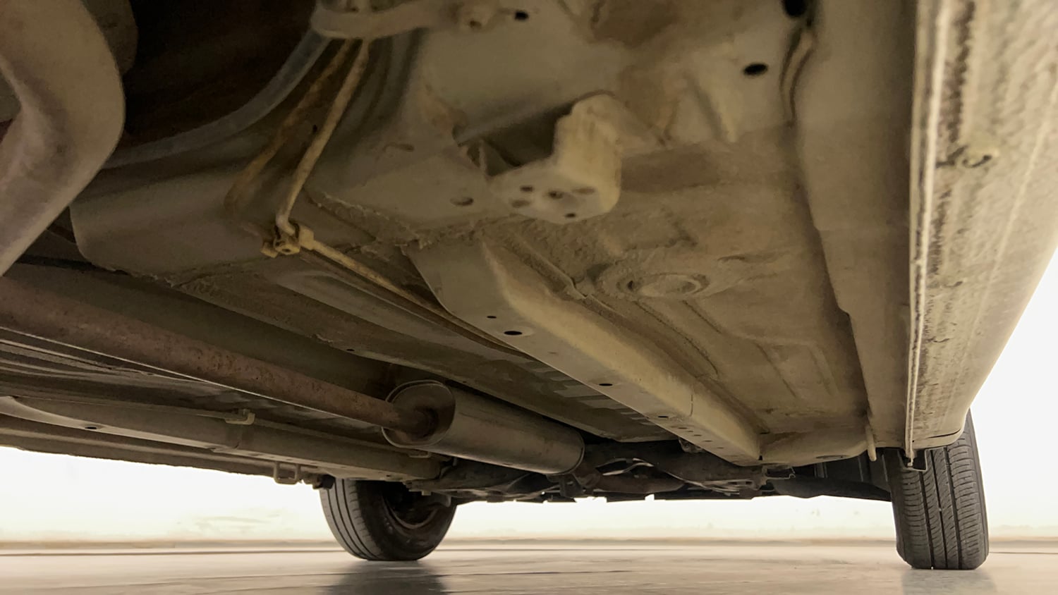 Used 2014 Maruti Suzuki Celerio VXi AMT Petrol Automatic extra REAR RIGHT UNDERBODY VIEW