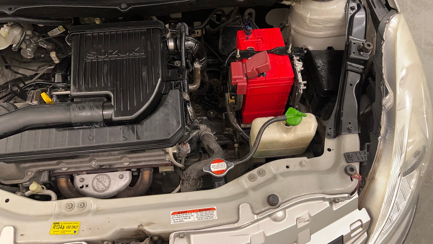 Used 2012 Maruti Suzuki Swift Dzire VXI Petrol Manual engine ENGINE LEFT SIDE VIEW