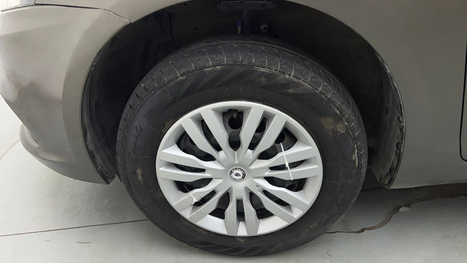 Used 2015 Maruti Suzuki Swift Dzire VXI Petrol Manual tyres LEFT FRONT TYRE RIM VIEW