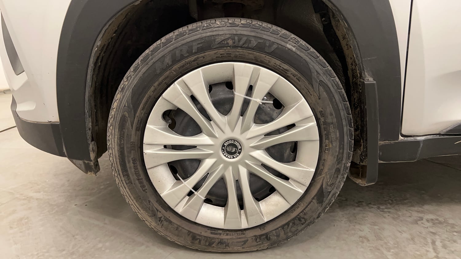Used 2019 Mahindra KUV100 NXT K6 Plus 6 STR Petrol Manual tyres LEFT FRONT TYRE RIM VIEW