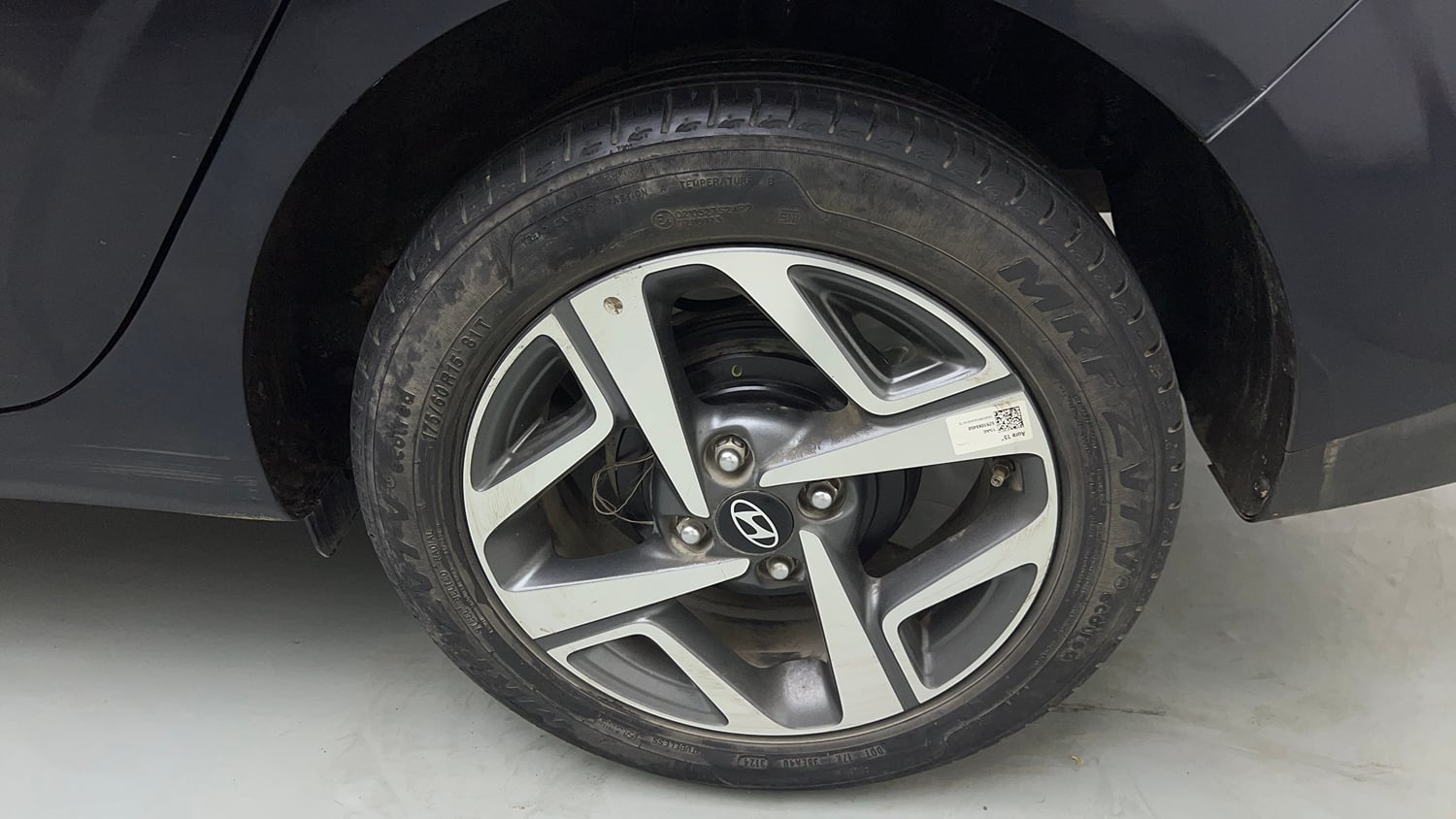 Used 2024 Hyundai Aura SX 1.2 CNG Cng Manual tyres LEFT REAR TYRE RIM VIEW