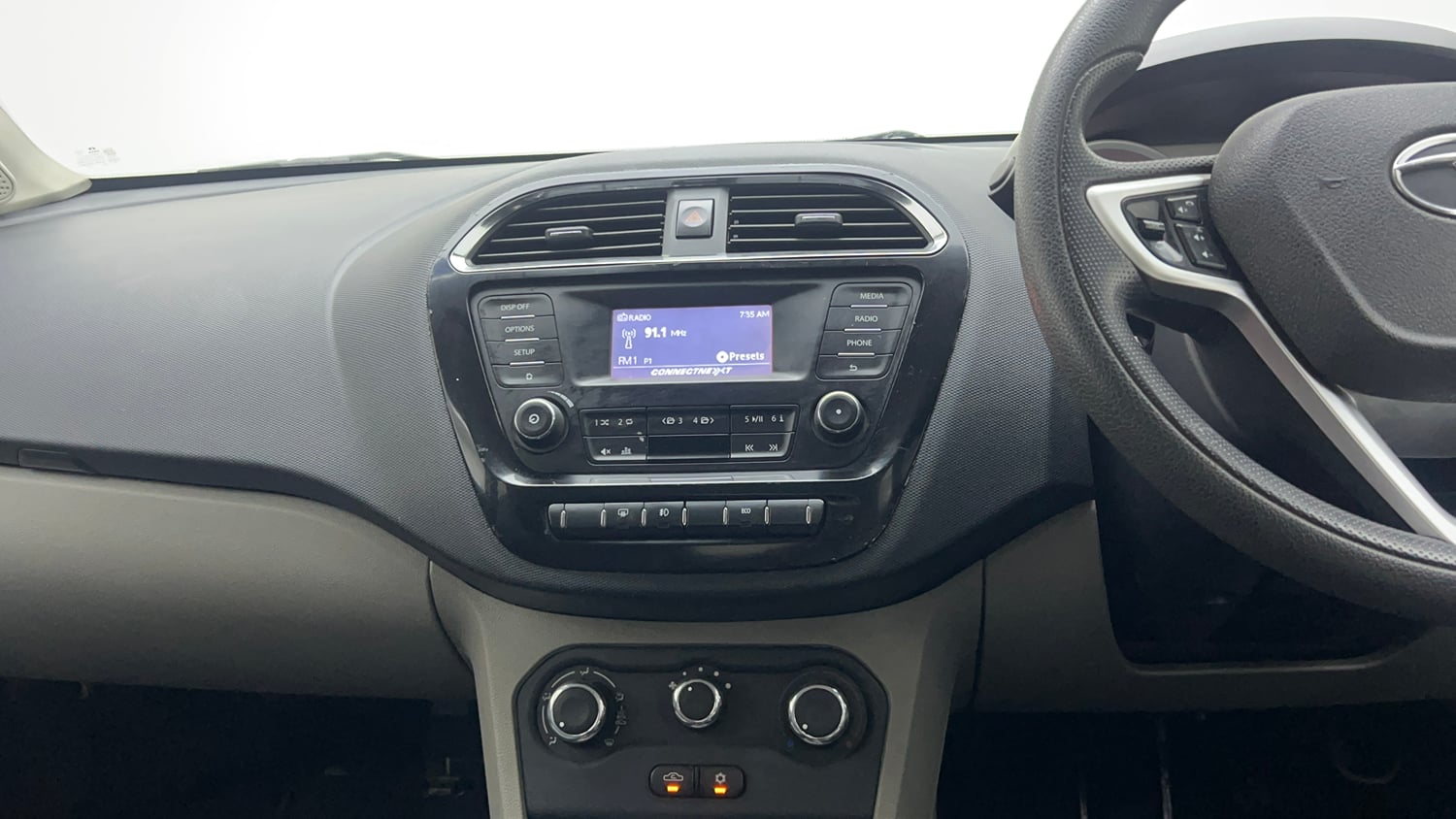 Used 2017 Tata Tiago Revotron XZ Petrol Manual interior MUSIC SYSTEM & AC CONTROL VIEW
