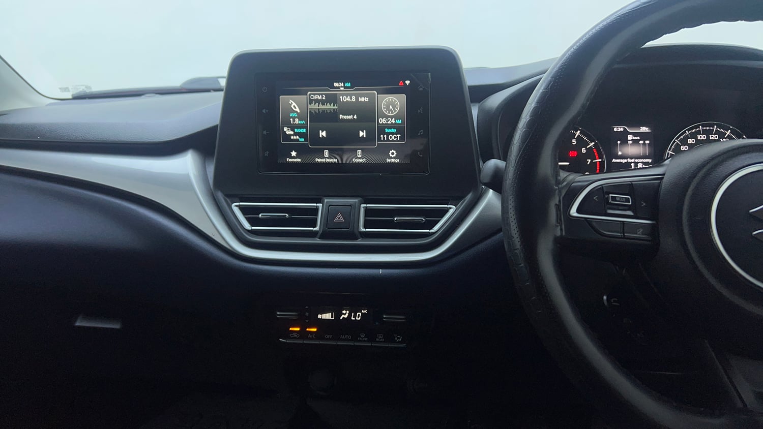Used 2023 Maruti Suzuki Baleno Zeta MT Petrol Manual top_features Integrated (in-dash) music system