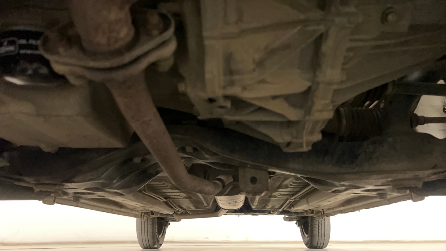 Used 2014 Maruti Suzuki Celerio VXi AMT Petrol Automatic extra FRONT LEFT UNDERBODY VIEW