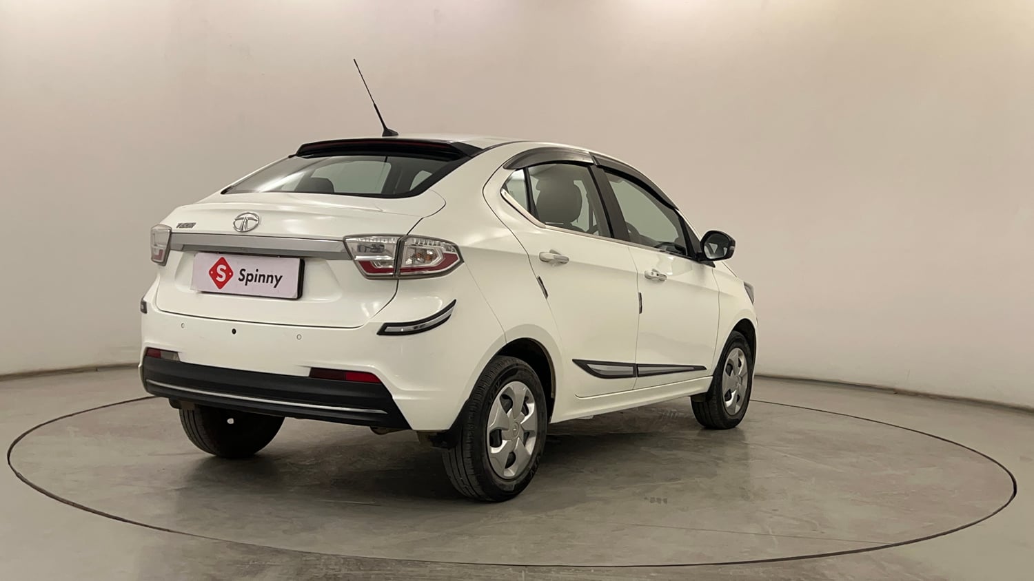 Used 2024 Tata Tigor XZ Petrol Manual exterior RIGHT REAR CORNER VIEW